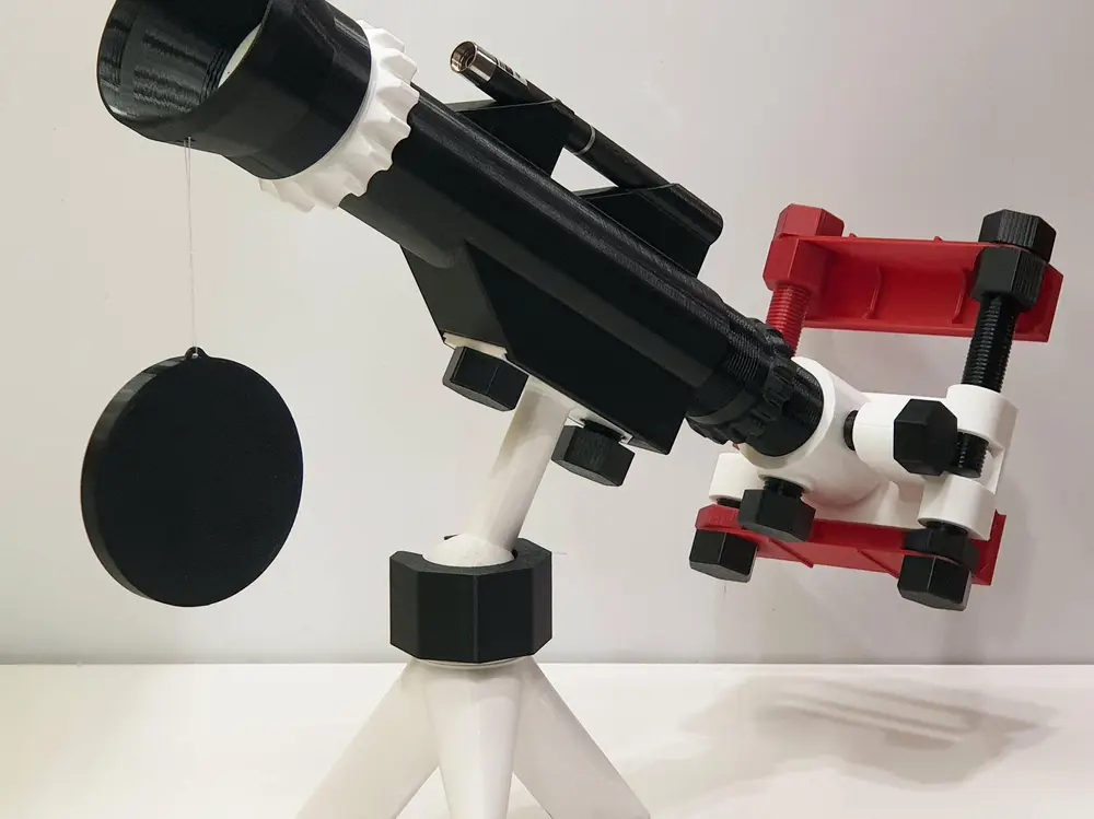 Telescope with laser and phone holder