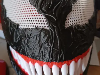 Venom helmet with movable jaw