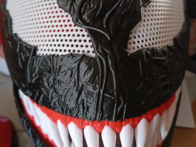 Venom helmet with movable jaw