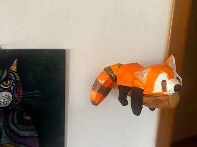 Red Panda lowpoly resting on a branch tree