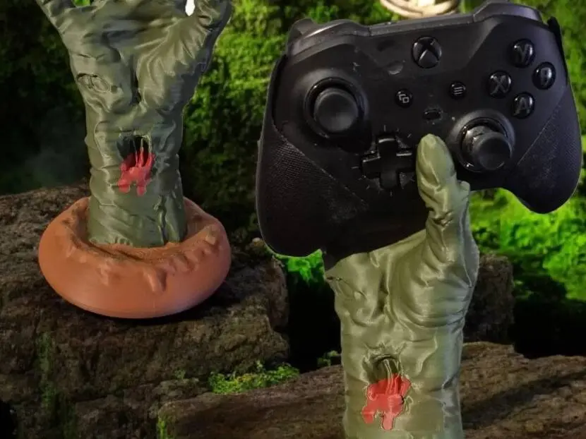 Zombie hand controller holder