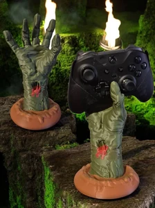 Zombie hand controller holder