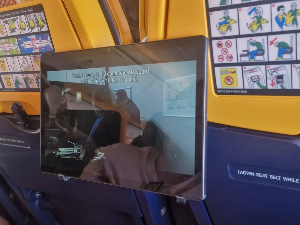 Stand and Airplane tablet/phone mount. Works on Ryanair and others