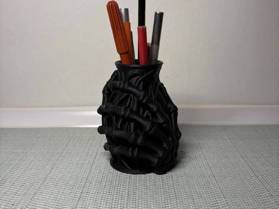 Skeletal hand pen holder/small vase