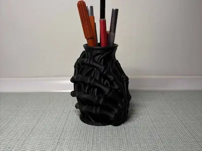 Skeletal hand pen holder/small vase