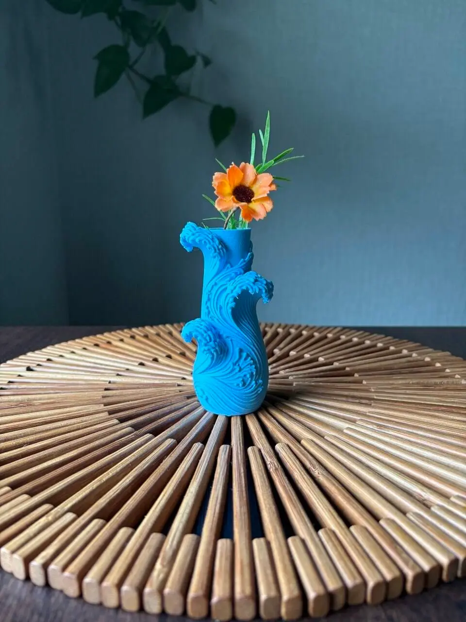 Wave vase with floral accent