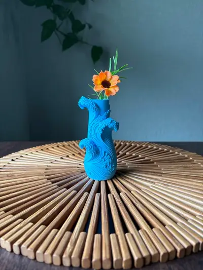Wave vase with floral accent
