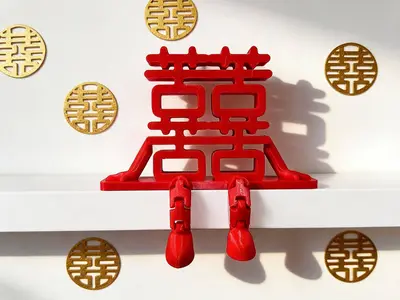 假装喜庆的苦苦摆件