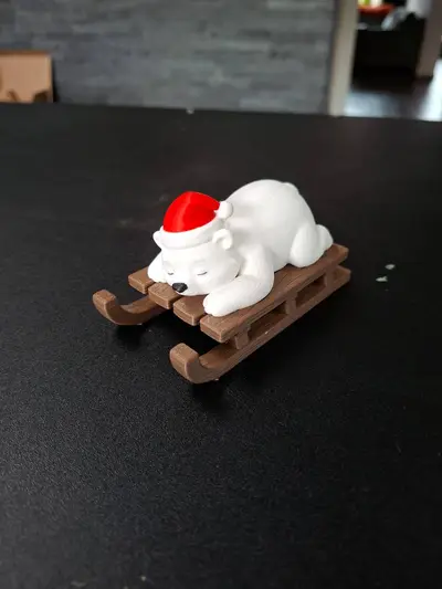 Cute Sleeping Christmas Polar Bear on Sled
