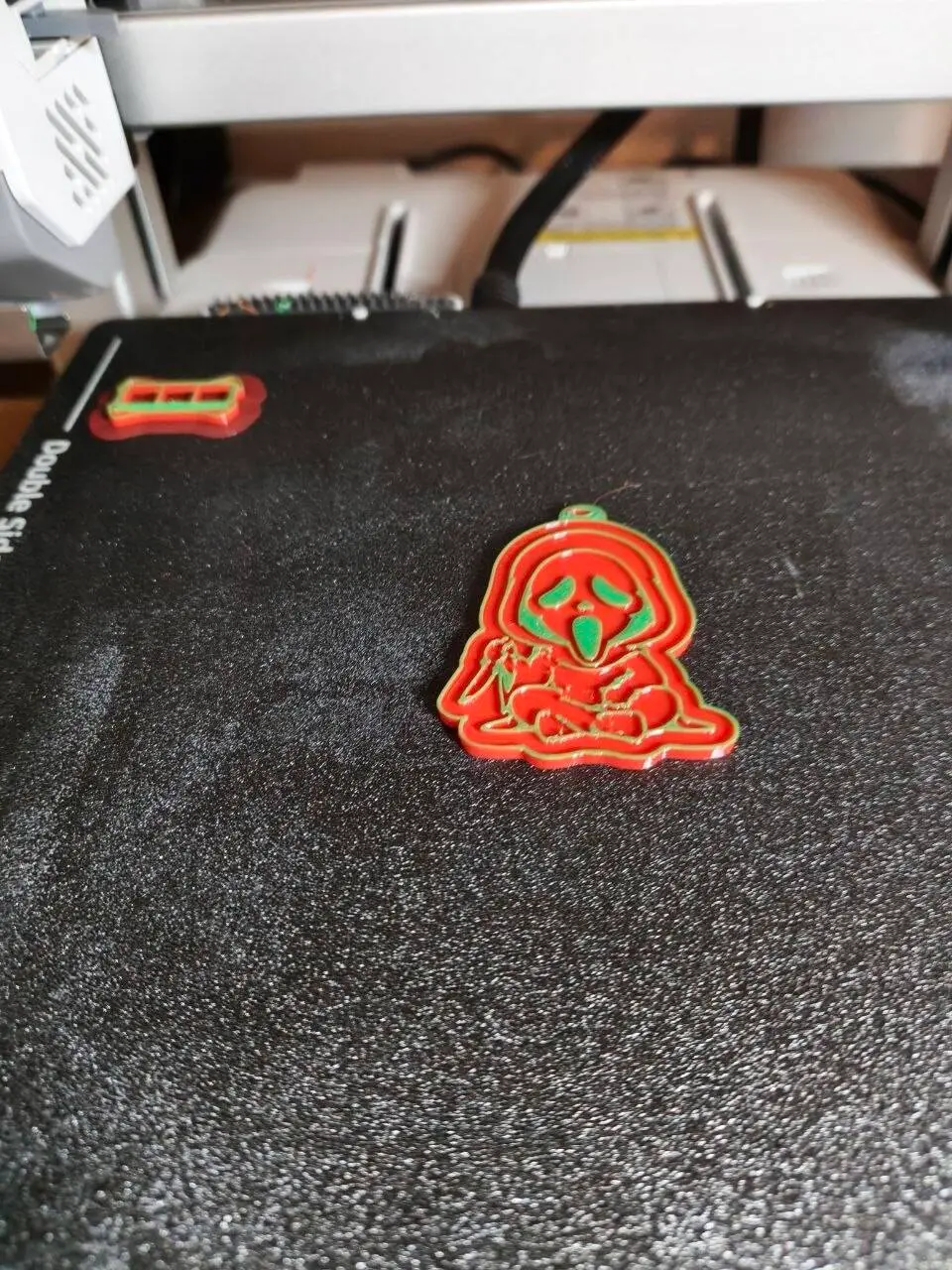 llavero o colgador de la santa muerte