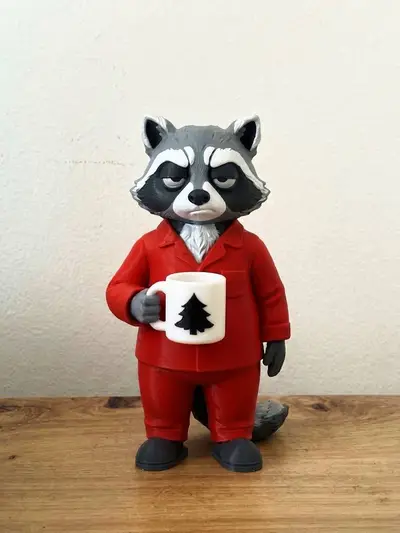 Grumpy Raccoon in Pajamas with Coffee Figurine